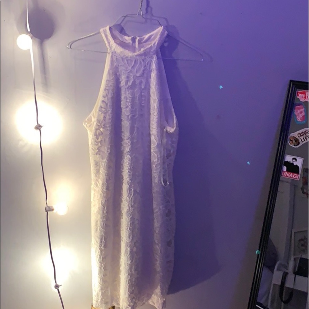 A white tight short dress